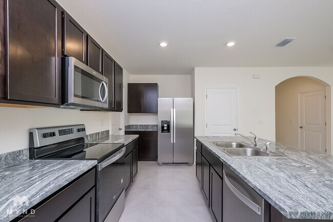 Foto del edificio - 7560 Cypress Walk Dr