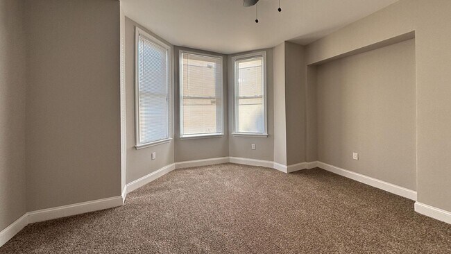 Building Photo - Bright 3BR with Sleek Vinyl Flooring & Modern Kitchen