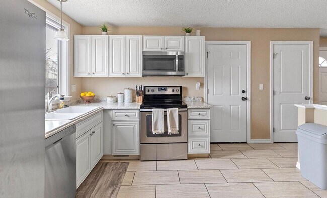 Building Photo - Charming 4 Bed, 2 Bath Home Near Peterson ...