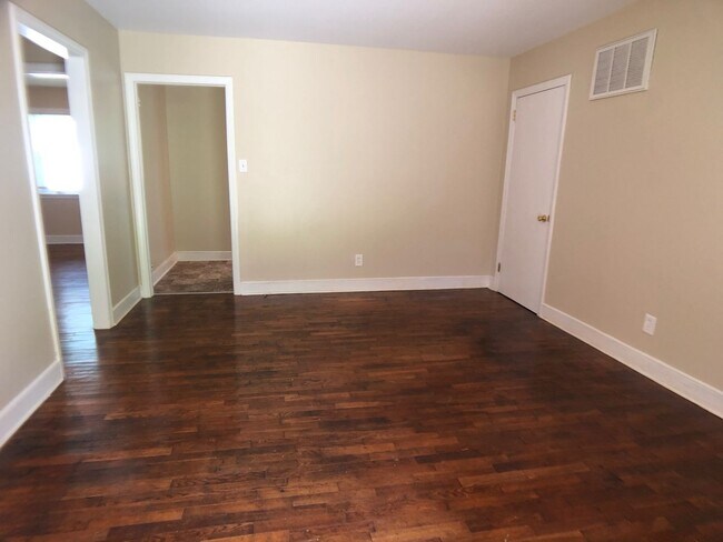 Building Photo - Two Bedroom Triplex on E. Bessemer