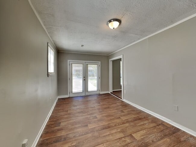Building Photo - One Month Free!  Charming 3 Bedroom locate...