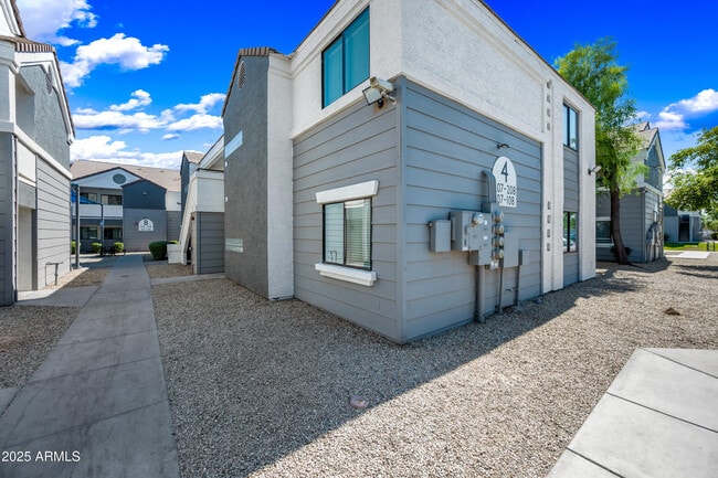 Building Photo - 3065 N 67th Ave