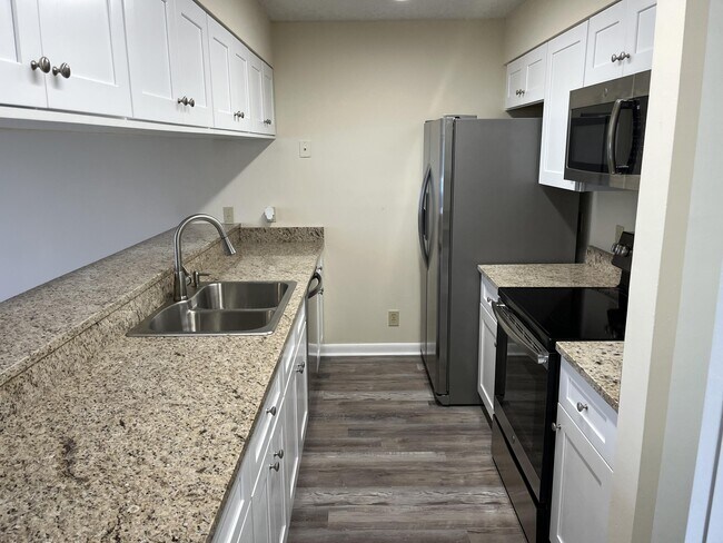 Foto del edificio - 6247 Riverwalk Ln