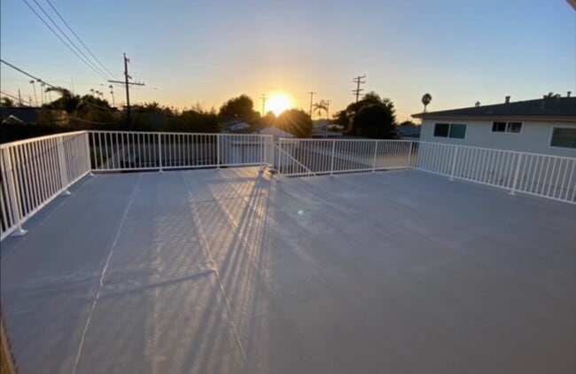 Large deck sunset - 155 Rochester St