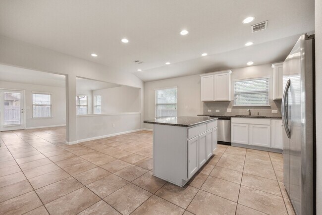 Building Photo - LOCATED ON A CORNER HOMESITE NEAR THE ELEM...