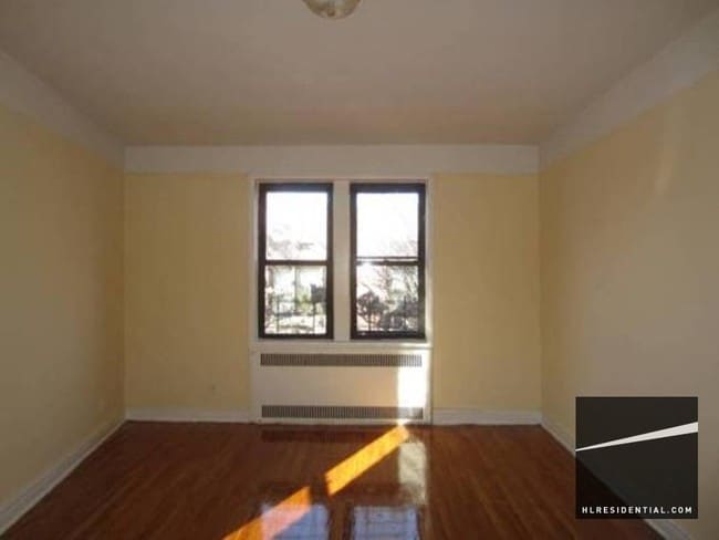Building Photo - 8449 Elmhurst Ave