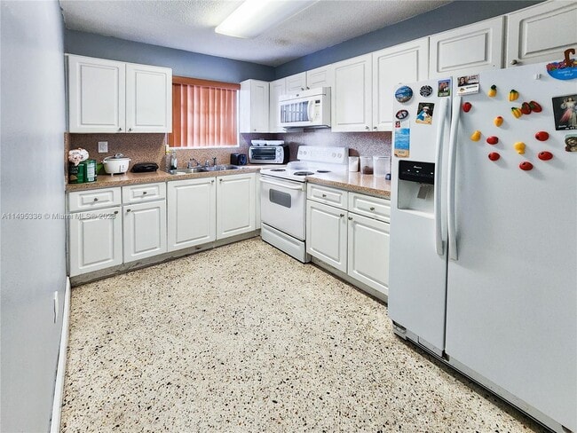 Building Photo - 75 NW 73rd Pl