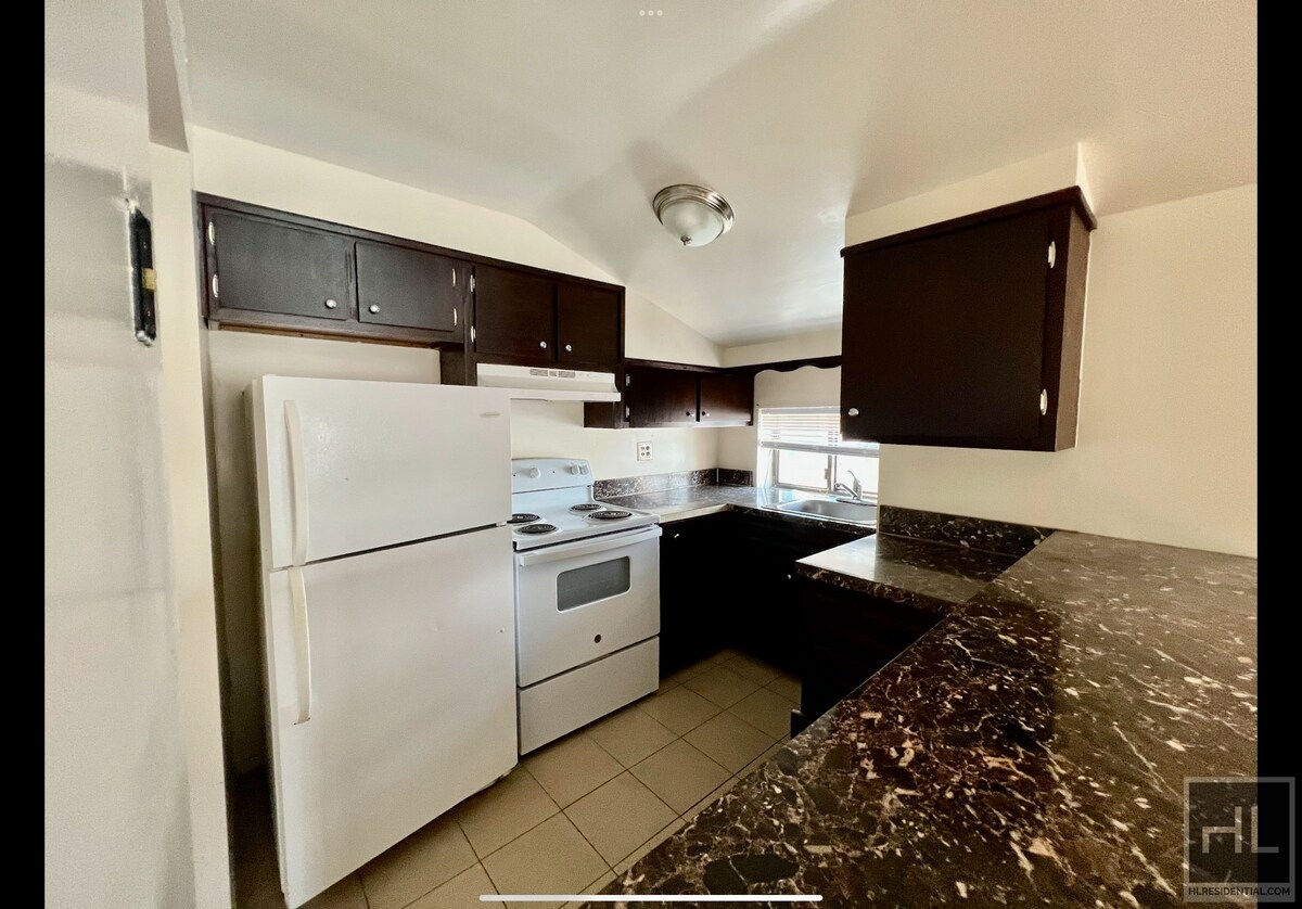 Primary Photo - Expansive 4 Bedrooms with 2 Full Bathrooms...