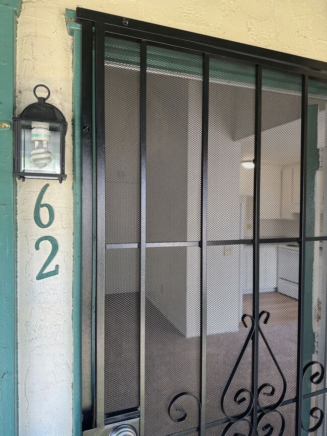 Building Photo - Upstairs two-bedroom 1/12 bath condo avail...