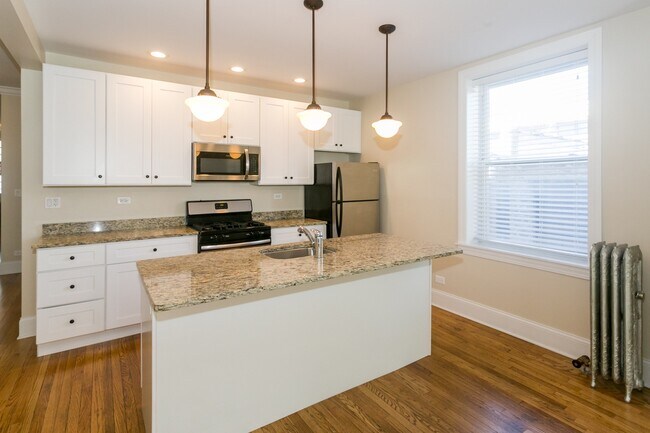 ¡Planos de planta abiertos - 5135-45 S. Ingleside Ave.