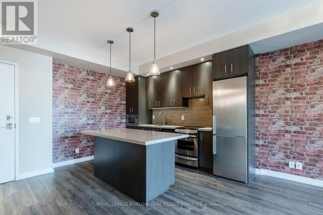 Photo du bâtiment - 457-457 Plains Rd E