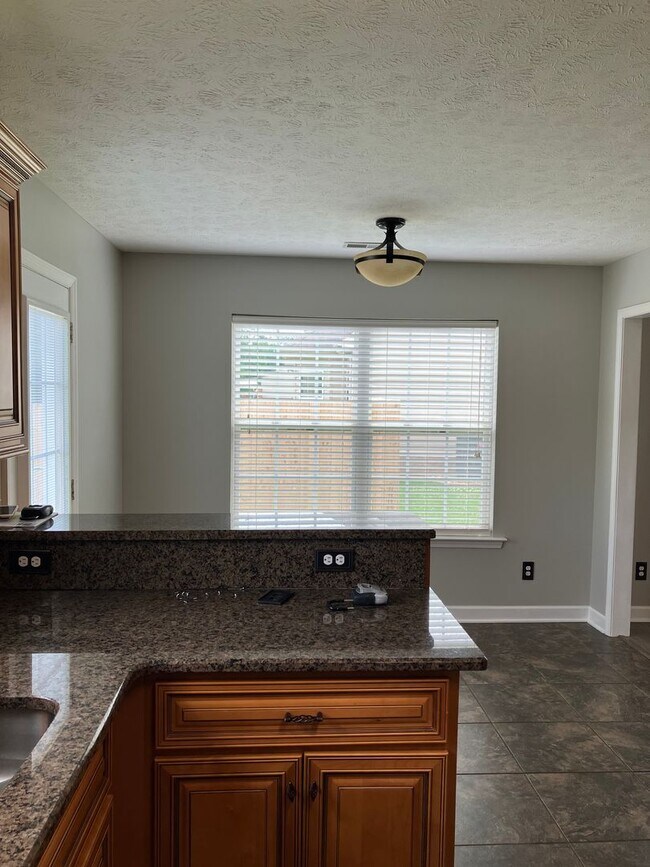 Building Photo - Spacious Home Centrally Located