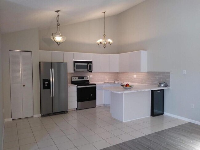 Building Photo - 9867 Boca Gardens Trail