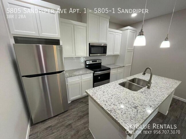 Foto del edificio - 5805 Sandpiper-UNDER CONTRACT, 5805-1 Sand...
