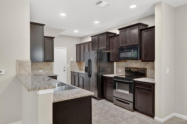 Building Photo - 516 E Slaughter Ln