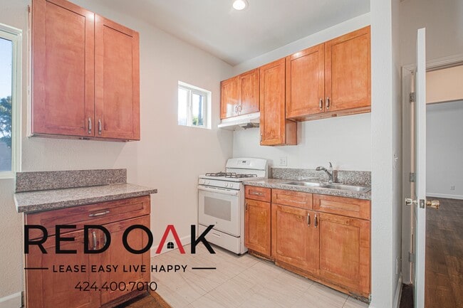 Foto del edificio - 1847 1/2 W Florence Ave