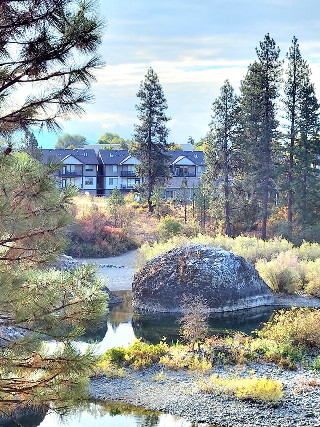 View of the apartments from the river - Riverside at Coyote Rock