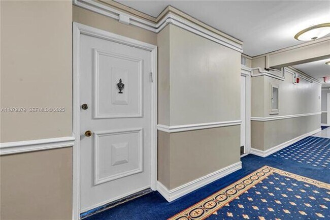 Building Photo - 5005 Collins Ave