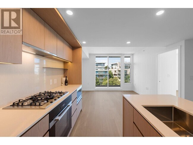 Photo du bâtiment - 5212-5212 Cambie Rd