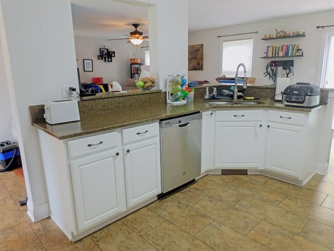 Building Photo - Colonial with Finished Basement and 2 Car ...