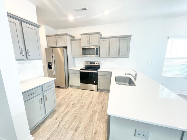 Building Photo - Brand New Paired Home with attached garage...