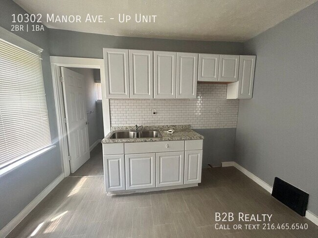 Foto del edificio - 10302 Manor Ave