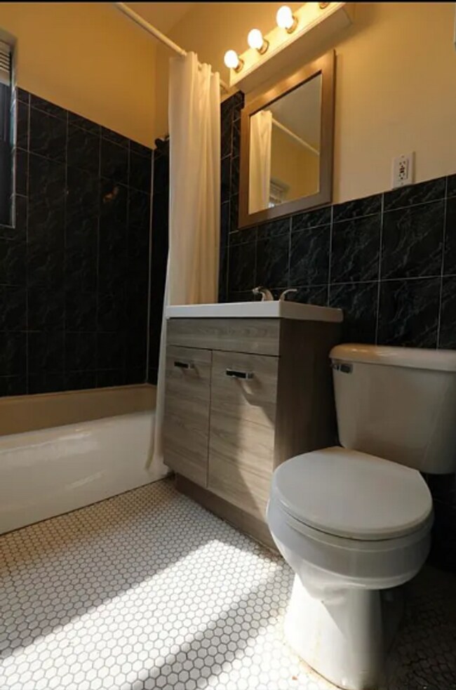 Building Photo - Watch YT Video Tour! Modern Apt w Ht/HW Included, Near T, NO FEE, Reduced Pricing! Spacious, Sunny!