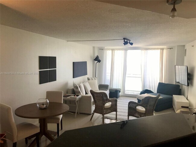Building Photo - 6917 Collins Ave
