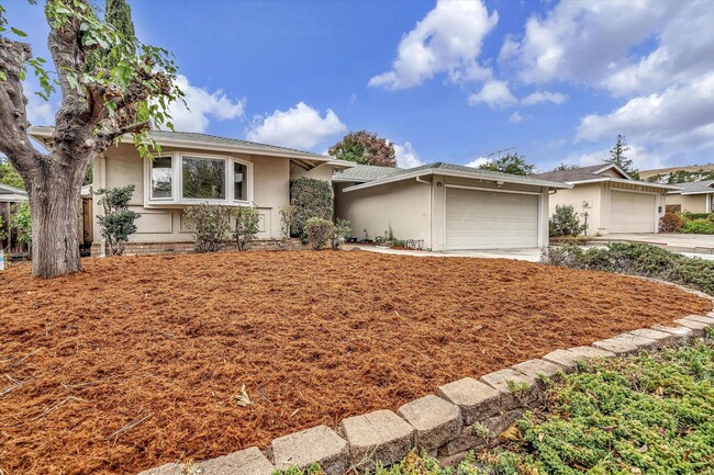 Building Photo - Available Soon! 4-Bedroom Gem with Stylish...