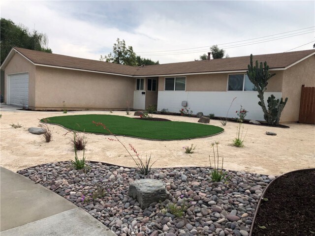 Building Photo - 8975 Delano Dr