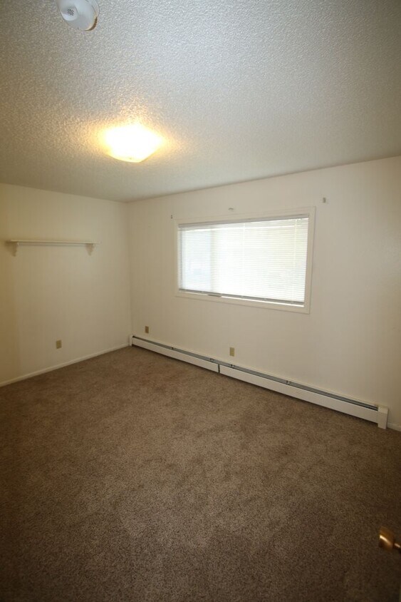 Primary Photo - 2 bedroom Unit with 1 Car Detached Garage!