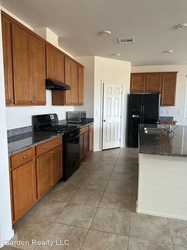 Foto del edificio - 4 br, 2.5 bath House - 9136 Cocowoods Place