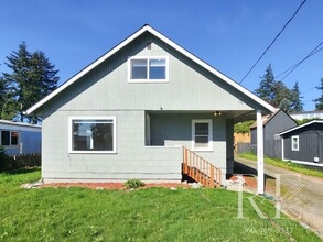 Building Photo - 1215 Evans Ave W