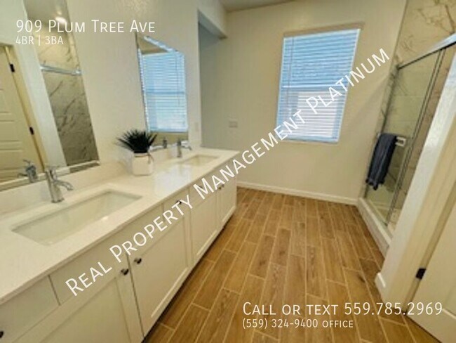 Foto del edificio - 909 Plum Tree Ave