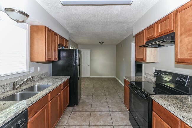 Building Photo - 6350 Limewood Ave