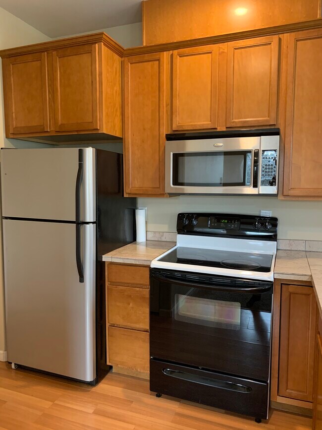 Nice clean appliances and cabinetry, also has small pantry for extra storage. - 103 Thendara Park Dr
