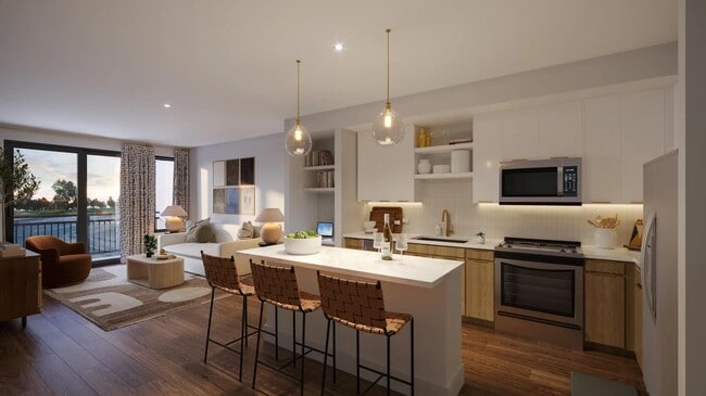 Gourmet kitchens with quartz countertops, 42-inch custom cabinetry with soft close, and under-cabinet lighting. - Modera Nations