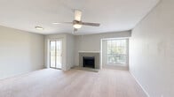 Located at 3301 River Park Dr in Fort Worth, Texas, this 2-bedroom, 4-bathroom single-story residence offers a well-organized layout across a comfortable footprint. The living room serves as the heart of the home, highlighted by a classic brick fireplace, soft carpeted flooring, and a ceiling fan overhead. Natural light filters in through blinded windows, offering pleasant outdoor views. The kitchen is thoughtfully updated with crisp white cabinetry, marble-style countertops, wood-look vinyl flooring, and a full suite of stainless steel appliances including a refrigerator, range, and over-the-range microwave. A dedicated in-unit laundry area is conveniently tucked adjacent to the kitchen. Both bedrooms feature plush carpeting, ceiling fans with lighting, and ample natural light from windows with outdoor views. Each bedroom includes closet space, with the primary bedroom offering a walk-in closet. The bathrooms are finished with marble-style countertops, white cabinetry, wide vanity mirrors, and wood-look flooring. Tub-shower combinations complete the full bathrooms. This residence combines practical amenities with clean, updated finishes throughout.