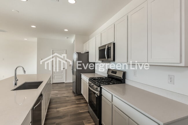 Foto del edificio - 10115 E Ulysses Ave