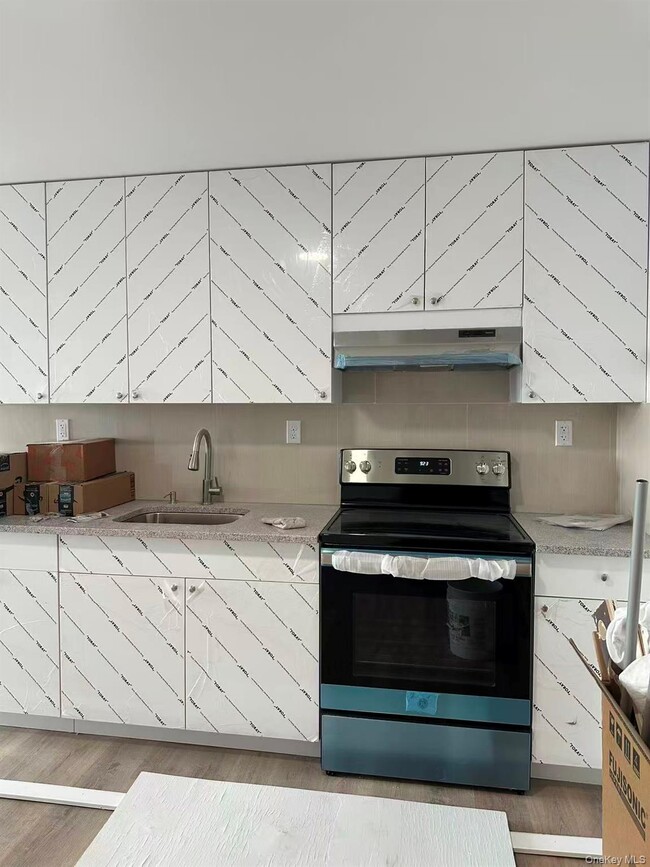 Building Photo - 70-33 Queens Blvd