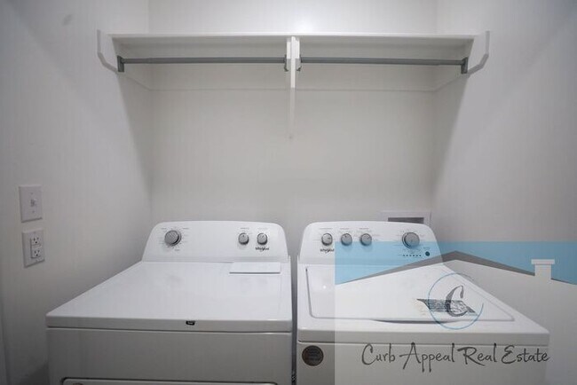 Building Photo - Move in special $800!! Luxury 2 bed, 1 bath duplex - new construction!! Washer, dryer, utilities ...