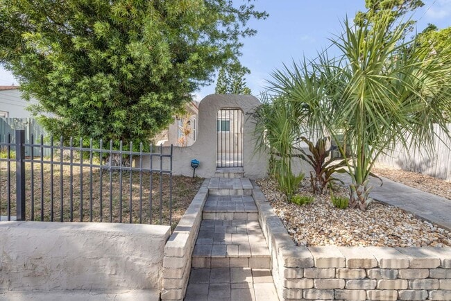 Building Photo - Renovated Spanish-Style 2/1 Beach Bungalow...