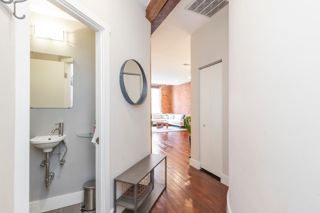 Mudroom entrance with half bath on left - 8 S Letitia St