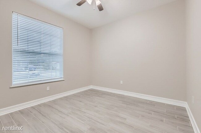 Building Photo - 3 br, 2 bath House - 1005 E 108Th Avenue UNIT
