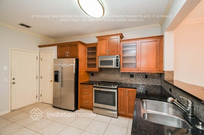 Building Photo - 7575 Scarlet Ibis Ln