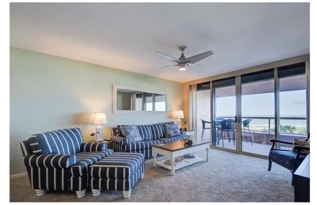 Building Photo - Newly Renovated Beachfront Condo with Stun...