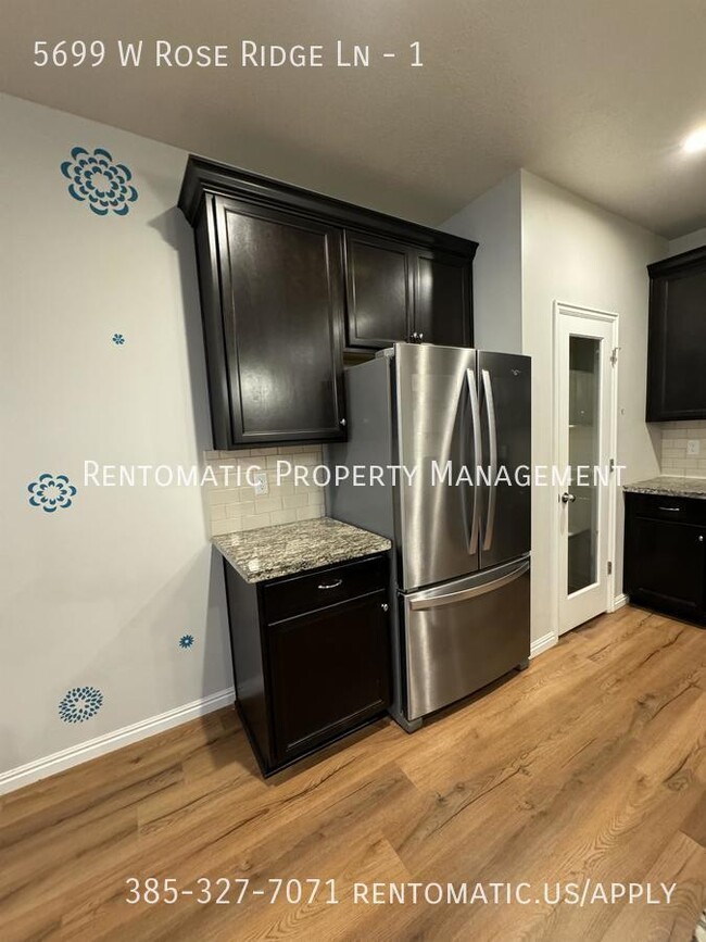 Building Photo - 5699 W Rose Ridge Ln