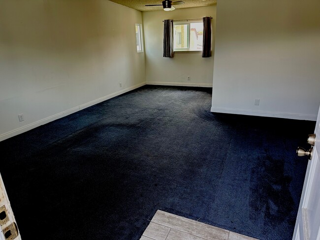 Living room and dining area: 23'3" x 15'6"/11'8" - 218 19th St