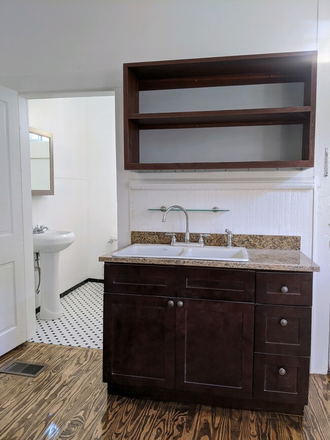 Kitchen sink, new wood floor - 2214 Valence St