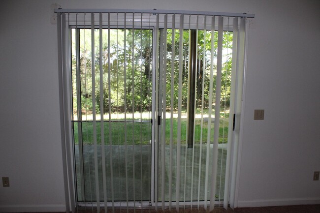 Basement patio. Sliding glass doors to yard and patio for activities - 2501 Ridge Rd